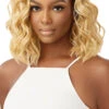 OUTRE - LACE FRONT SLEEKLAY PART NYLA WIG -Zoe Beauty Supply Shop QLSLP Nyla DR4 Golden Honey Blonde Sub A